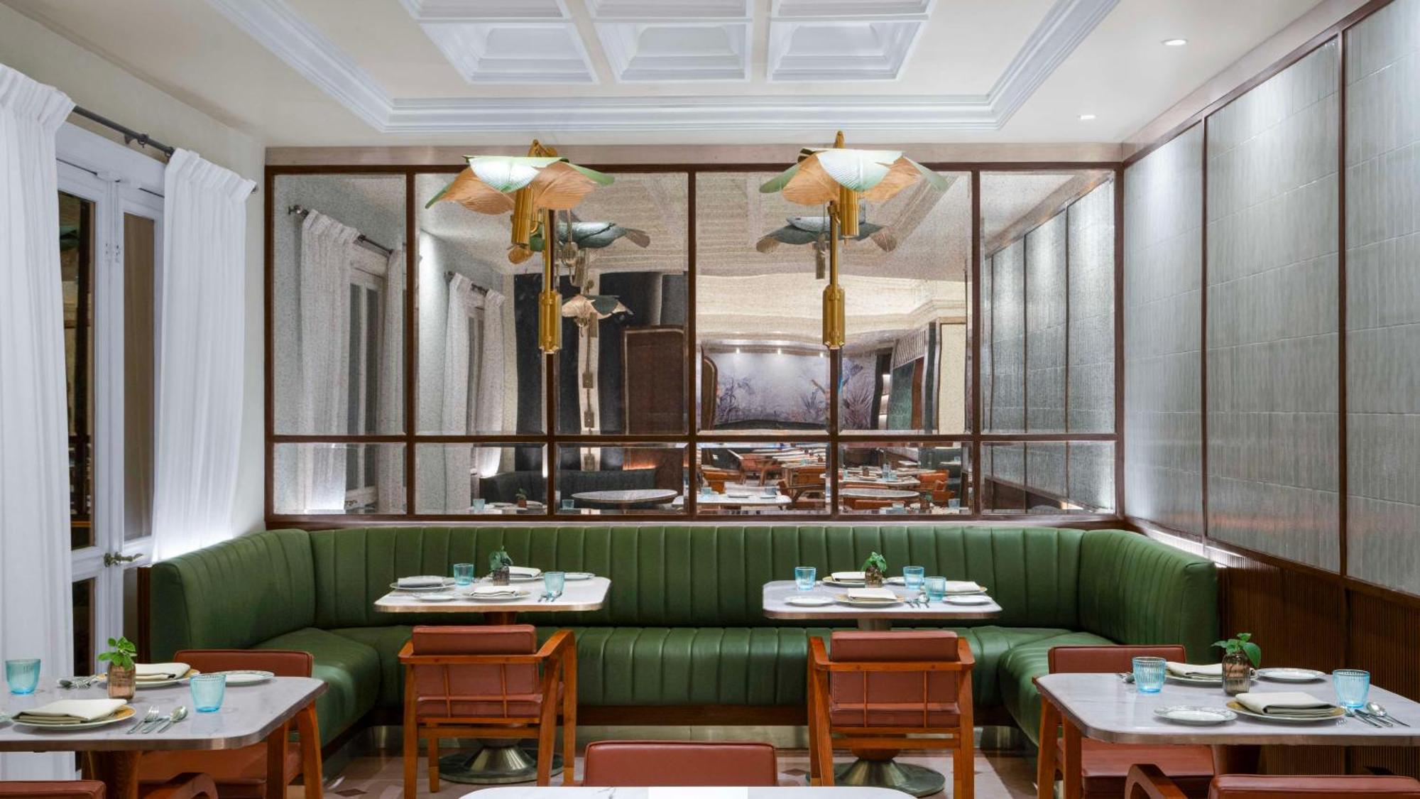 ฮิลตัน มุมไบ อินเตอร์เนชั่นแนล แอร์พอร์ต Hotel ภายนอก รูปภาพ The interior of the restaurant